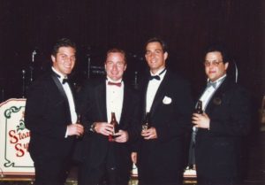 Four men in tuxedos